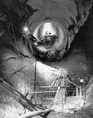 Aftermath of 1983 snow melt: East spillway repairs at Glen Canyon Dam